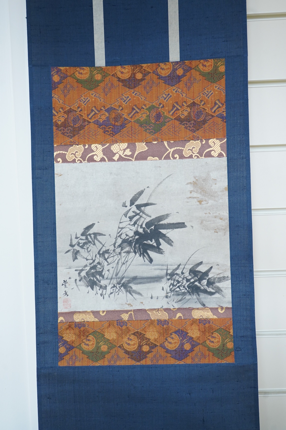 Four Japanese scrolls, to include a monochrome study of birds amongst lily pads, each boxed